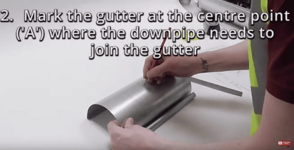 Screenshot of the brief video instructions for cutting galvanised steel gutter for the wrap-around outlet
