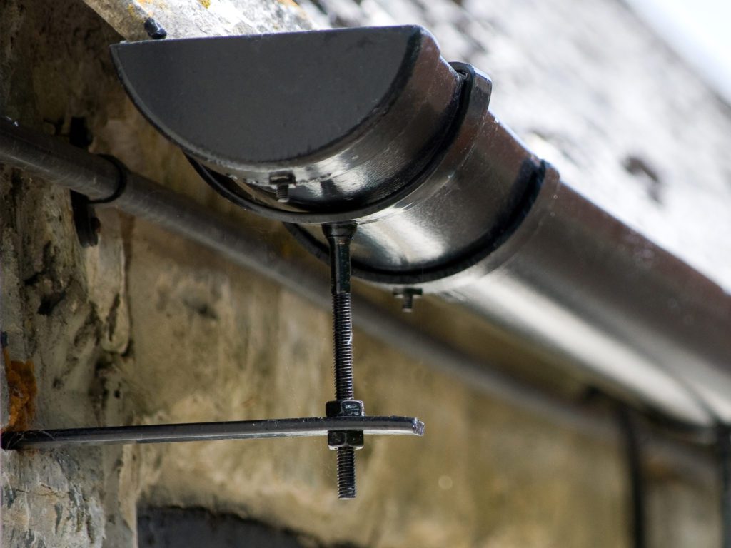 An example of Cast Aluminium Rise & Fall Brackets on a Farm House in Wiltshire