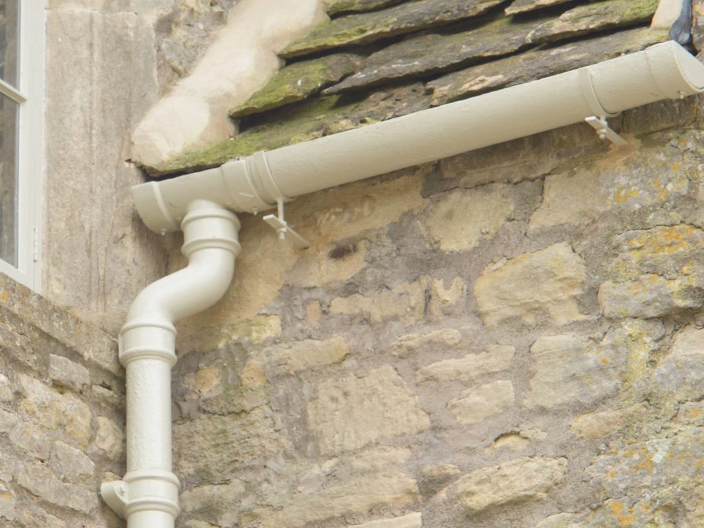 An example of Cast Iron Rise & Fall Brackets on a Manor House in Box, Wiltshire