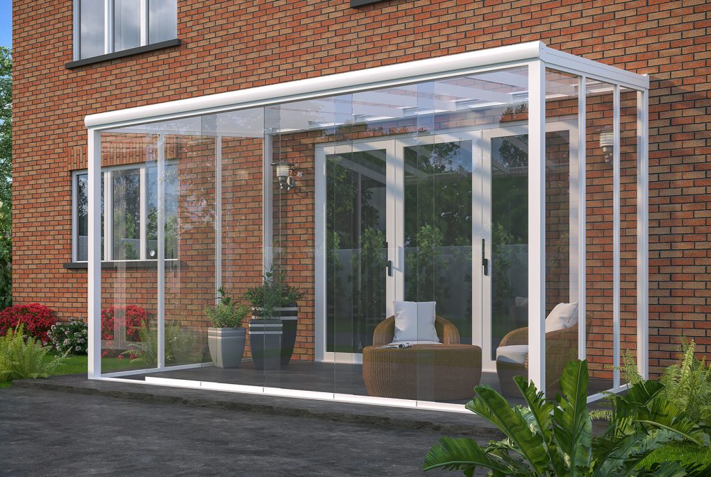 Image  5. 5x3m white aluminium frame garden room with 8mm laminated safety glass roof panels, 2 sets of 3 track doors and 1 set of split 3 track doors